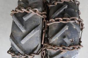2 TIRES WITH CHAINS