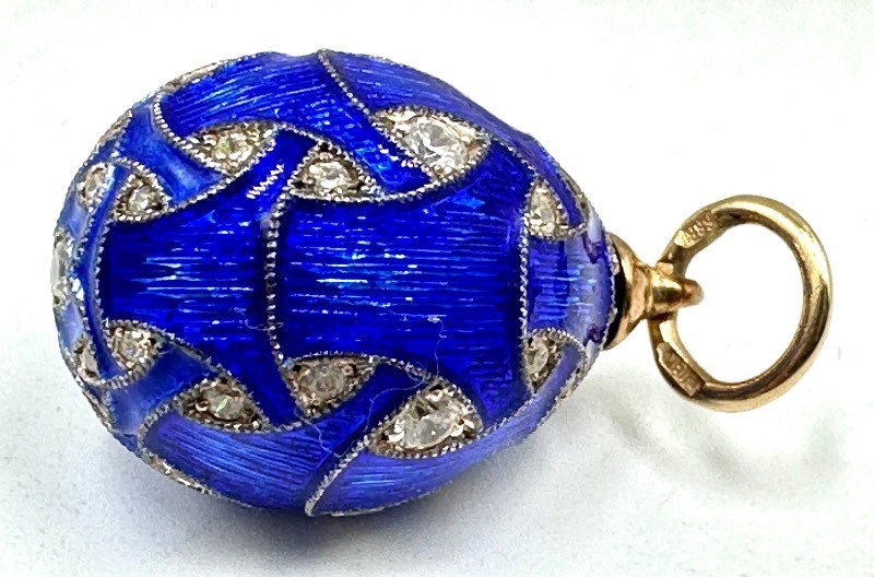 lot 41 image: Vintage Russian 14K Gold Silver Blue Enamel 46 Cubic Zirconium Egg Pendant