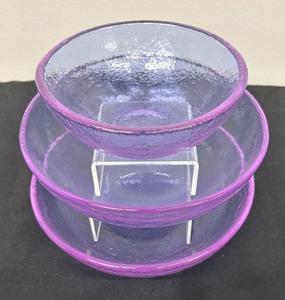 lot 29 image: Set of Three Fire and Light Lavender Glass Bowls
