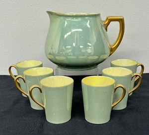lot 32 image: Vintage T & V Limoges Pitcher with Six Mugs
