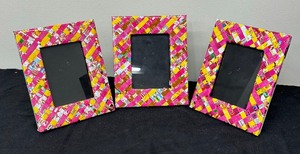 lot 36 image: Three Colorful Candy Wrapper Frames