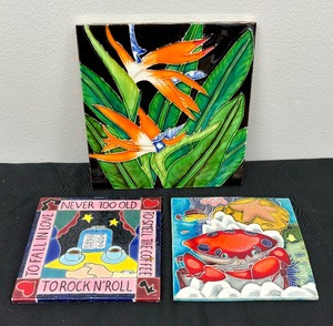 lot 44 image: Three Colorful Decorative Trivets