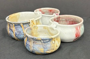 lot 55 image: Quadruple Connected Pottery Bowls