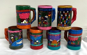 lot 99 image: Seven Colorful Ethnic Designs Pottery Mugs