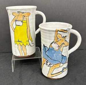 lot 69 image: Two Cow Lake Pottery Mugs