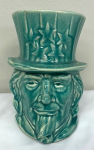 lot 176 image: Vintage McCoy Uncle Sam Planter  Vase