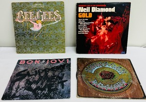 lot 94C image: Four Vintage Record Albums including The BeeGees Main Course, Bon Jovi Slippery When Wet and More