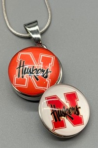 lot 71F image: University of Nebraska Huskers Snap Necklace with Sterling Silver Chain