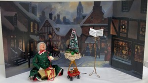 lot 216 image: Byers Choice Ltd - Mrs. Claus Sitting with Gifts and Other Goodies