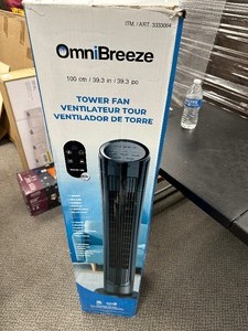 lot 102 image: Omni Breeze Tower Fan with Remote Works - Minor Damage to top Side see pictures