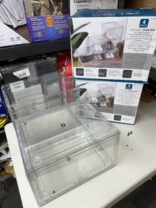 lot 84 image: 7 Stackable Shoe Boxes - 1 assembled box has some damage