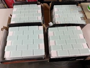 lot 69 image: Qty 40  4 Cases of Jeffery Court Siberian Gloss Green 11.625 in. x 11.625 in. Interlocking Gloss Glass Mosaic Tile (0.938 sq. ft.Each) Retail $400