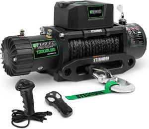 lot 26 image: Like New Stegodon Jungle Explorer 13000 LBS Electric Winch T3, 12V W Synthetic Rope and wired and wireless remotes - Retail $459.99