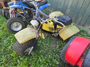 lot 35 image: Tri-Moto 175 Parts or Repair - Yellow ATV - Item is Off Site in SVEA See Desc