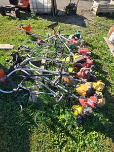 lot 49 image: Large Lot of Weed Trimmers - For Parts or Repair - Item is Off Site in SVEA See Desc