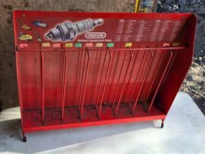 lot 75 image: Oregon Outdoor Equipment Spark Plug Display Rack - Vintage Red