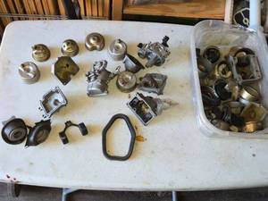 lot 146 image: Group of Small Engine Carburetors and Components