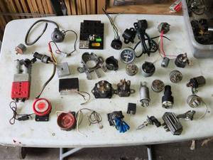 lot 215 image: Assortment of Automotive and Small Engine Electrical Components and Parts