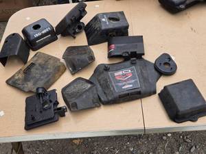 lot 218 image: Various Small Engine Filter Covers and Other Covers