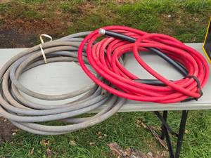 lot 262 image: Assortment of Heavy-Duty Hoses Red one is Pressure Hose, Grey One Has Ends Cut