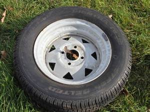 lot 291 image: P17570R13 Tire Mounted on Steel Rim