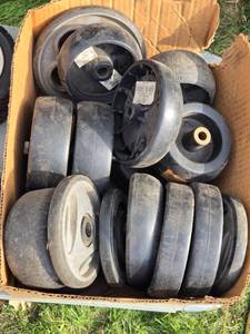 lot 305 image: Lot of Mostly Lawn Mower Deck Wheels and Others