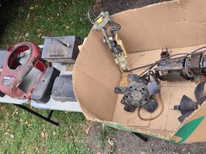 lot 332 image: Assorted Lawn Equipment Parts - Mix of Fans, Casing, and Components