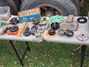 lot 337 image: Assortment of Used Weed Trimmer Parts - Various Components