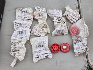lot 338 image: Group of 12 Red Spool Retainers - Green Machine Parts