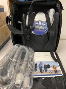 lot 9 image: MSRP $1800 NEW IN BOX&nbspResMed 30034 AutoSet Respond Advantage with Hose, Carry Bag,&nbspPower Supply&nbspand Manual