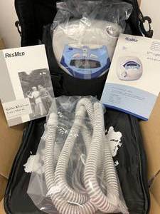 lot 10 image: MSRP $2400 NEW IN BOX&nbspResMed 30011 S7 Lightweight CPAP Machine with Hose, Carry Bag,&nbspPower Supply&nbspand Manual