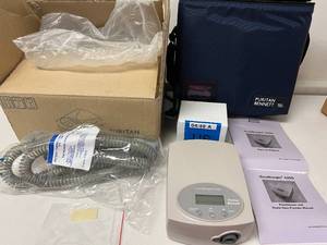 lot 14 image: MSRP $800 NEW IN BOX&nbspPuritan Bennett GoodKnight 420G Travel Portable CPAP Machine System with Hose, Power Supply, Bag, and Manual -&nbspThe 420G changes the pressure automatically with altitude changes.