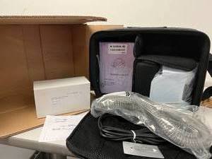 lot 17 image: MSRP $500 NEW IN BOX Puritan Bennett Sandman Intro CPAP Machine WHumidifier, Hose, Power Supply, Carry Bag & Manual -&nbspeven with the integrated humidifier, the device remains lightweight & robust enough for nightly use at home or on the road.