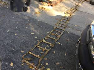 lot 234 image: 25 Ft Roll-Up Ladder 12 Wide