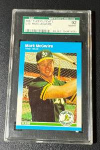 lot 18 image: Mark McGwire RC 1987 Fleer Update #U-76 Graded SGC 92 NMMT Rookie Baseball Card