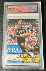 lot 19 image: Tim Duncan RC Graded 9 Mint 1997-98 Fleer #201 Rookie Basketball Card