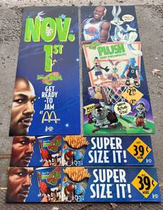 lot 11B image: (4) Michael Jordan Space Jam McDonalds Advertisements - (2) 2-Sized 48x20 Plush Looney Tunes Characters and (2) 38x8 Super Size It - Basketball