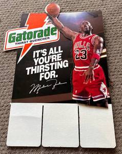 lot 14B image: Michael Jordan Gatorade Basketball Advertisement 29x23