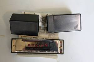 lot 20 image: Austin Harmonica with Two Covers - Live Music Capital of the World