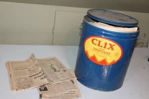 lot 27 image: Vintage CLIX Ideal Shortening Tin with Collection of Newspapers