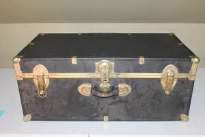 lot 34 image: Vintage Black Metal Trunk with Brass Accents
