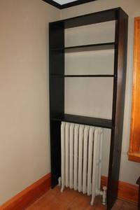 lot 62 image: Modern Black Bookshelf with Radiator Space - Stylish Storage Solution