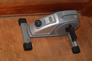 lot 88 image: Sunny Health & Fitness Compact Mini Exercise Bike - Adjustable Tension