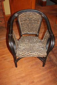 lot 91 image: Vintage Curved Rattan Armchair with Black Frame
