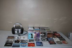 lot 134 image: Collection of Music CDs and Portable CD Player