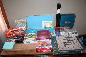 lot 143 image: Assortment of Board Games and Puzzles - Includes Yahtzee, Scrabble, Monopoly, and More