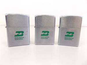 lot 64 image: 1969, 1970, and 1970 Burlington Northern Zippo Lighters