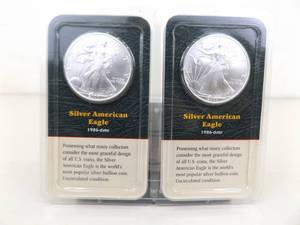 lot 78 image: 2 Littleton 2000 American Silver Eagles In Original Packaging