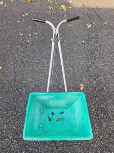 lot 62 image: Used Red Devil Handheld Push Spreader