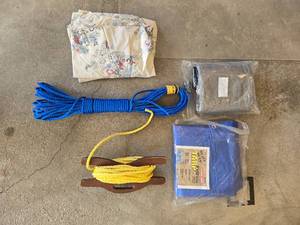 lot 72 image: Collection of Outdoor Equipment Tarp, 2 Ropes, and Floral Sheet Set